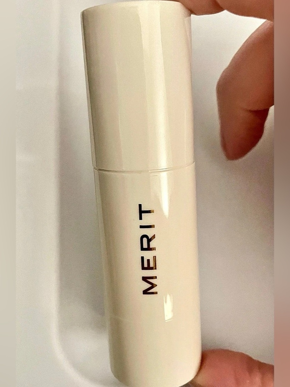 MERIT Solstice Day Glow Highlighter Balm Brown